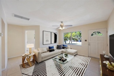 One or more photo(s) has been virtually staged. Charming on Mangrove Bay Golf Course in Florida - for sale on GolfHomes.com, golf home, golf lot