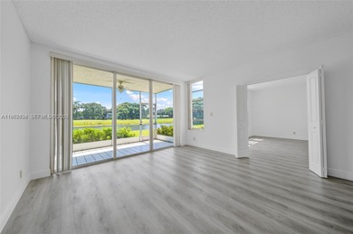 Excellent unit overlooking the golf course and lake on Palm-Aire Country Club and Resort - The Oaks in Florida - for sale on GolfHomes.com, golf home, golf lot