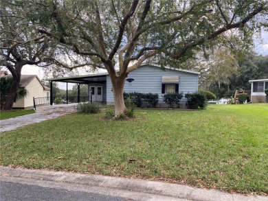 NEW PRICE .... Charming manufactured home in a Gated Community on Orange Blossom Hills Golf and Country Club in Florida - for sale on GolfHomes.com, golf home, golf lot