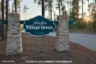 This stunning 2.67-acre parcel is a combination of two lots, lot on Foxfire Golf and Country Club in North Carolina - for sale on GolfHomes.com, golf home, golf lot