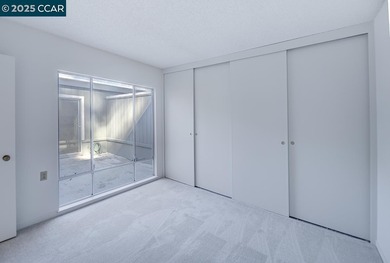 Single story, level-in nicely situated in quiet Rossmoor on Rossmoor Golf Course in California - for sale on GolfHomes.com, golf home, golf lot