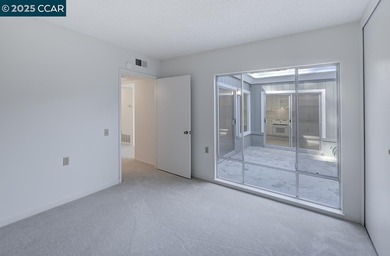 Single story, level-in nicely situated in quiet Rossmoor on Rossmoor Golf Course in California - for sale on GolfHomes.com, golf home, golf lot