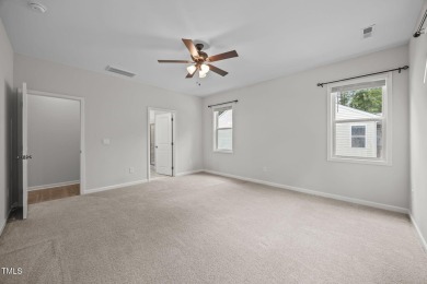 Convenient  one-floor living w/bright & open floor plan an on River Golf and Country Club at Lake Royale in North Carolina - for sale on GolfHomes.com, golf home, golf lot