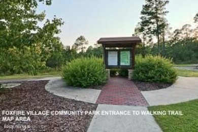 This stunning 1.4-acre waterfront lot on Lake Blum in the on Foxfire Golf and Country Club in North Carolina - for sale on GolfHomes.com, golf home, golf lot