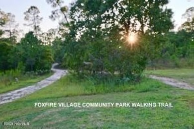 This stunning 2.67-acre parcel is a combination of two lots, lot on Foxfire Golf and Country Club in North Carolina - for sale on GolfHomes.com, golf home, golf lot