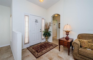 Welcome to this stunning 2-bedroom, plus a den, 2-bath home on Tampa Bay Golf and Country Club in Florida - for sale on GolfHomes.com, golf home, golf lot