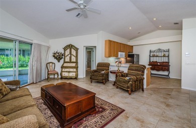 Welcome to this stunning 2-bedroom, plus a den, 2-bath home on Tampa Bay Golf and Country Club in Florida - for sale on GolfHomes.com, golf home, golf lot