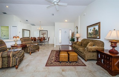 Welcome to this stunning 2-bedroom, plus a den, 2-bath home on Tampa Bay Golf and Country Club in Florida - for sale on GolfHomes.com, golf home, golf lot