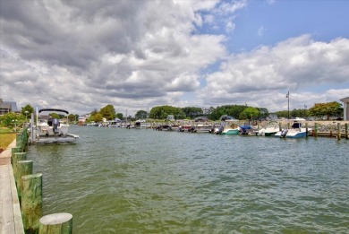 Spectacular Waterfront in Captain's Cove Golf & Yacht Club - and on Captains Cove Golf and Yacht Club in Virginia - for sale on GolfHomes.com, golf home, golf lot