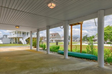 Spectacular Waterfront in Captain's Cove Golf & Yacht Club - and on Captains Cove Golf and Yacht Club in Virginia - for sale on GolfHomes.com, golf home, golf lot