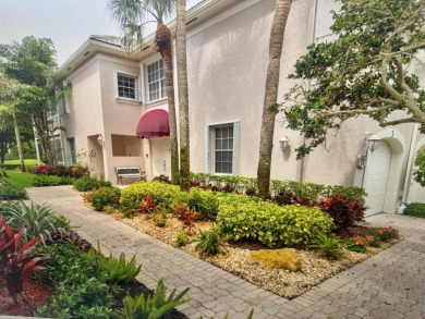 Updated bright and light first floor condo with lake and golf on  in Florida - for sale on GolfHomes.com, golf home, golf lot