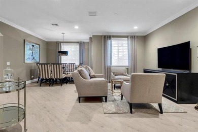 Immaculate corner residence with serene views of lush greenery on Weston Hills Country Club in Florida - for sale on GolfHomes.com, golf home, golf lot