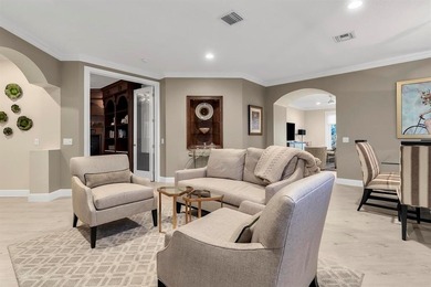 Immaculate corner residence with serene views of lush greenery on Weston Hills Country Club in Florida - for sale on GolfHomes.com, golf home, golf lot