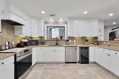 From the moment you arrive, stunning brick & stone architecture on De Cordova Bend Country Club in Texas - for sale on GolfHomes.com, golf home, golf lot