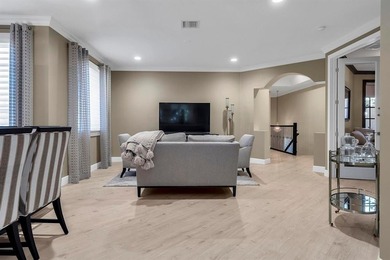 Immaculate corner residence with serene views of lush greenery on Weston Hills Country Club in Florida - for sale on GolfHomes.com, golf home, golf lot