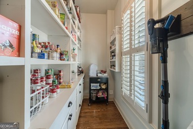 Welcome home to this beautifully designed residence offering on The Georgia Club in Georgia - for sale on GolfHomes.com, golf home, golf lot