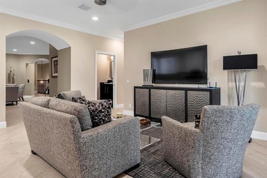 Immaculate corner residence with serene views of lush greenery on Weston Hills Country Club in Florida - for sale on GolfHomes.com, golf home, golf lot