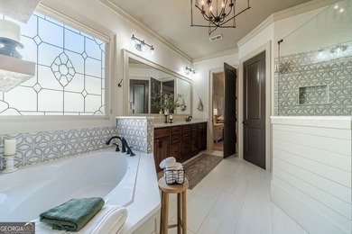 Welcome home to this beautifully designed residence offering on The Georgia Club in Georgia - for sale on GolfHomes.com, golf home, golf lot