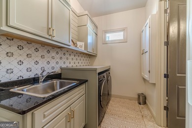 Welcome home to this beautifully designed residence offering on The Georgia Club in Georgia - for sale on GolfHomes.com, golf home, golf lot