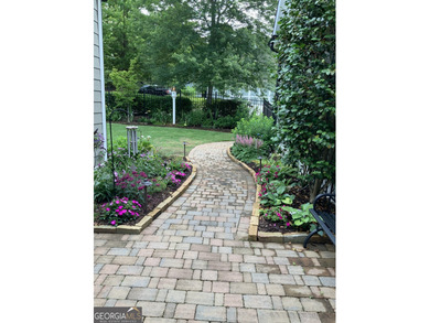 Welcome home to this beautifully designed residence offering on The Georgia Club in Georgia - for sale on GolfHomes.com, golf home, golf lot