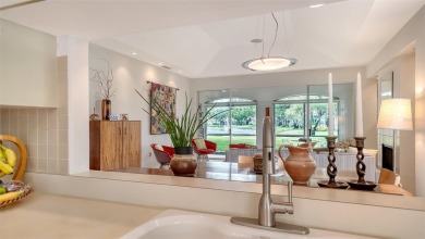 Enjoy long pond views and convenient access to the neighborhood on The Meadows Golf and Country Club in Florida - for sale on GolfHomes.com, golf home, golf lot