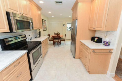 Located in the very active Eaglewood Golf and Tennis Community on Eagle Wood Golf Course in Florida - for sale on GolfHomes.com, golf home, golf lot