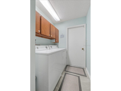 Welcome to this beautifully maintained 2-bedroom, 2-bath home in on Sandpiper Golf Club in Florida - for sale on GolfHomes.com, golf home, golf lot