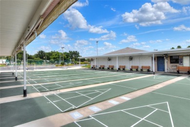 Welcome to this beautifully maintained 2-bedroom, 2-bath home in on Sandpiper Golf Club in Florida - for sale on GolfHomes.com, golf home, golf lot