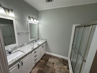 Located in the Foley Grove, a charming land-leased 55+ on Gulf Links Executive Golf Course in Alabama - for sale on GolfHomes.com, golf home, golf lot