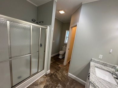 Located in the Foley Grove, a charming land-leased 55+ on Gulf Links Executive Golf Course in Alabama - for sale on GolfHomes.com, golf home, golf lot
