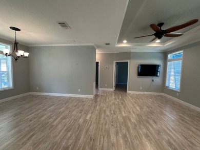 Located in the Foley Grove, a charming land-leased 55+ on Gulf Links Executive Golf Course in Alabama - for sale on GolfHomes.com, golf home, golf lot