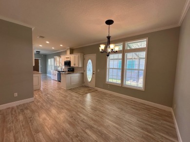 Located in the Foley Grove, a charming land-leased 55+ on Gulf Links Executive Golf Course in Alabama - for sale on GolfHomes.com, golf home, golf lot