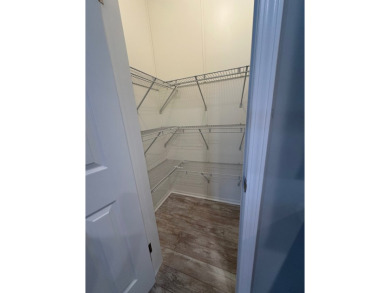Located in the Foley Grove, a charming land-leased 55+ on Gulf Links Executive Golf Course in Alabama - for sale on GolfHomes.com, golf home, golf lot