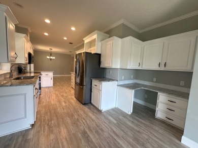 Located in the Foley Grove, a charming land-leased 55+ on Gulf Links Executive Golf Course in Alabama - for sale on GolfHomes.com, golf home, golf lot