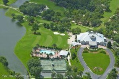 Nestled on the 2nd tee of the prestigious Glen Lakes Golf and on Glen Lakes Country Club in Florida - for sale on GolfHomes.com, golf home, golf lot