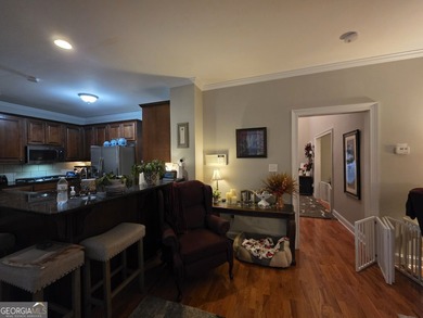 Welcome to this beautifully maintained all-brick home, ideally on Canongate At Georgia National Golf Club in Georgia - for sale on GolfHomes.com, golf home, golf lot