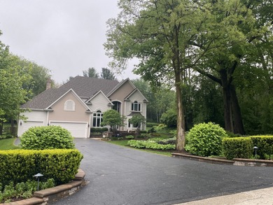 This perfectly maintained two story home on the first hole at on Bull Valley Golf Club in Illinois - for sale on GolfHomes.com, golf home, golf lot