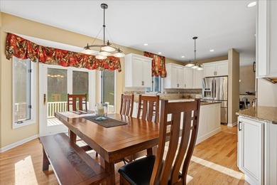 This perfectly maintained two story home on the first hole at on Bull Valley Golf Club in Illinois - for sale on GolfHomes.com, golf home, golf lot