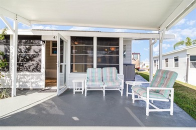 Beautifully updated and modern 1-bedroom, 1-bath home located on on Polo Park East in Florida - for sale on GolfHomes.com, golf home, golf lot