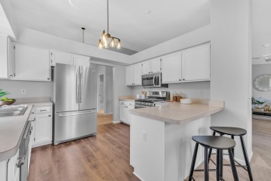 This beautifully maintained 2 bed, 2.5-bath end unit ranch condo on Fellows Creek Golf Club in Michigan - for sale on GolfHomes.com, golf home, golf lot
