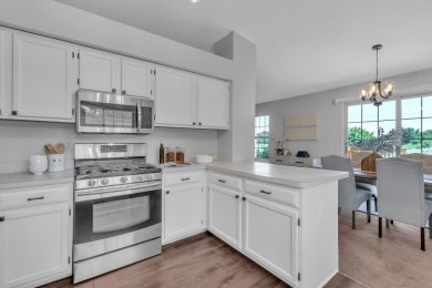 This beautifully maintained 2 bed, 2.5-bath end unit ranch condo on Fellows Creek Golf Club in Michigan - for sale on GolfHomes.com, golf home, golf lot