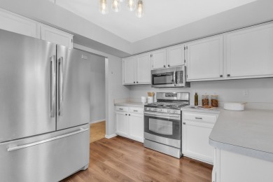 This beautifully maintained 2 bed, 2.5-bath end unit ranch condo on Fellows Creek Golf Club in Michigan - for sale on GolfHomes.com, golf home, golf lot