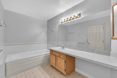 This beautifully maintained 2 bed, 2.5-bath end unit ranch condo on Fellows Creek Golf Club in Michigan - for sale on GolfHomes.com, golf home, golf lot