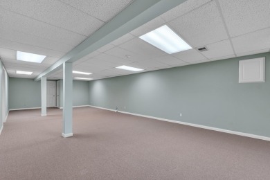 This beautifully maintained 2 bed, 2.5-bath end unit ranch condo on Fellows Creek Golf Club in Michigan - for sale on GolfHomes.com, golf home, golf lot
