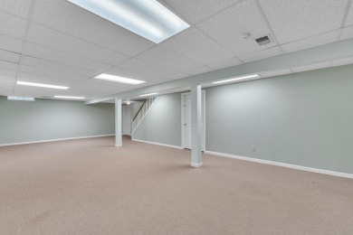 This beautifully maintained 2 bed, 2.5-bath end unit ranch condo on Fellows Creek Golf Club in Michigan - for sale on GolfHomes.com, golf home, golf lot