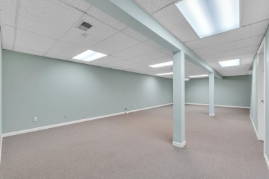 This beautifully maintained 2 bed, 2.5-bath end unit ranch condo on Fellows Creek Golf Club in Michigan - for sale on GolfHomes.com, golf home, golf lot