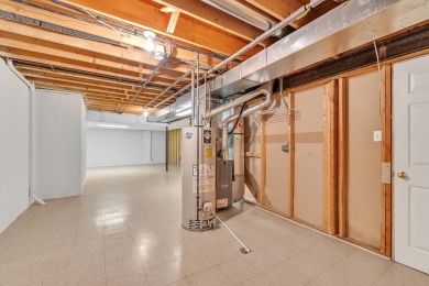 This beautifully maintained 2 bed, 2.5-bath end unit ranch condo on Fellows Creek Golf Club in Michigan - for sale on GolfHomes.com, golf home, golf lot