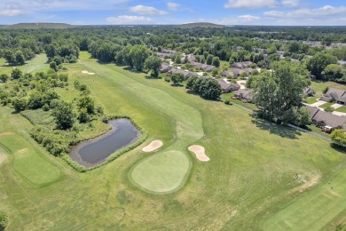 This beautifully maintained 2 bed, 2.5-bath end unit ranch condo on Fellows Creek Golf Club in Michigan - for sale on GolfHomes.com, golf home, golf lot