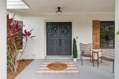 Welcome to this beautifully updated pool home overlooking the on Northdale Golf and Tennis Club in Florida - for sale on GolfHomes.com, golf home, golf lot