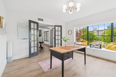 Welcome to this beautifully updated pool home overlooking the on Northdale Golf and Tennis Club in Florida - for sale on GolfHomes.com, golf home, golf lot